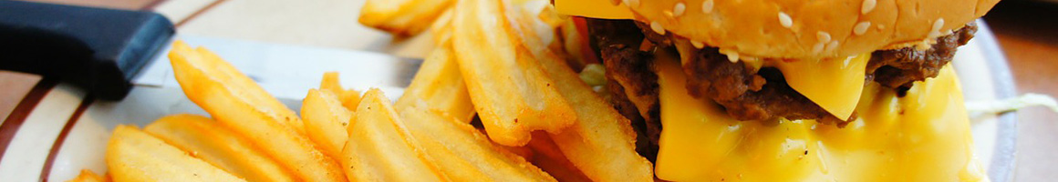 Eating Burger at H & T Burgers restaurant in Kaneohe, HI.